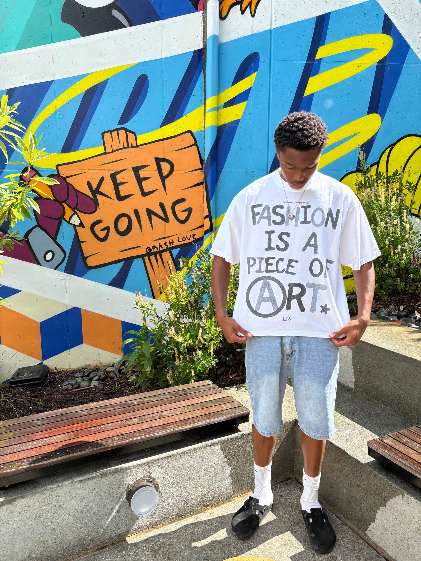 “FASHION IS A PIECE OF ART” – Graphic Drop Shoulder Tee