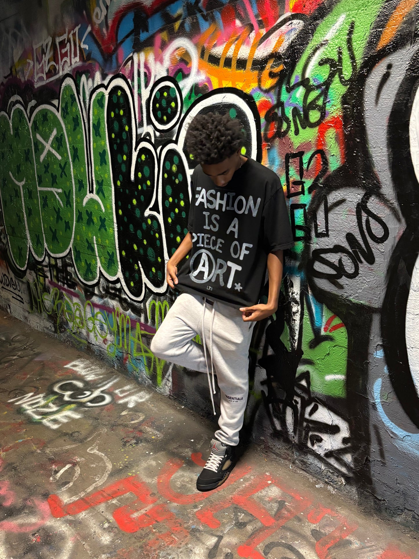 “FASHION IS A PIECE OF ART” – Graphic Drop Shoulder Tee